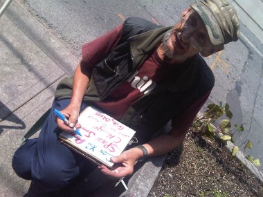 Tony brightening up his sign - Aug 7 2009